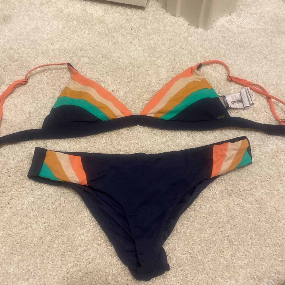 Rip curl swim suit small top and medium bottoms.